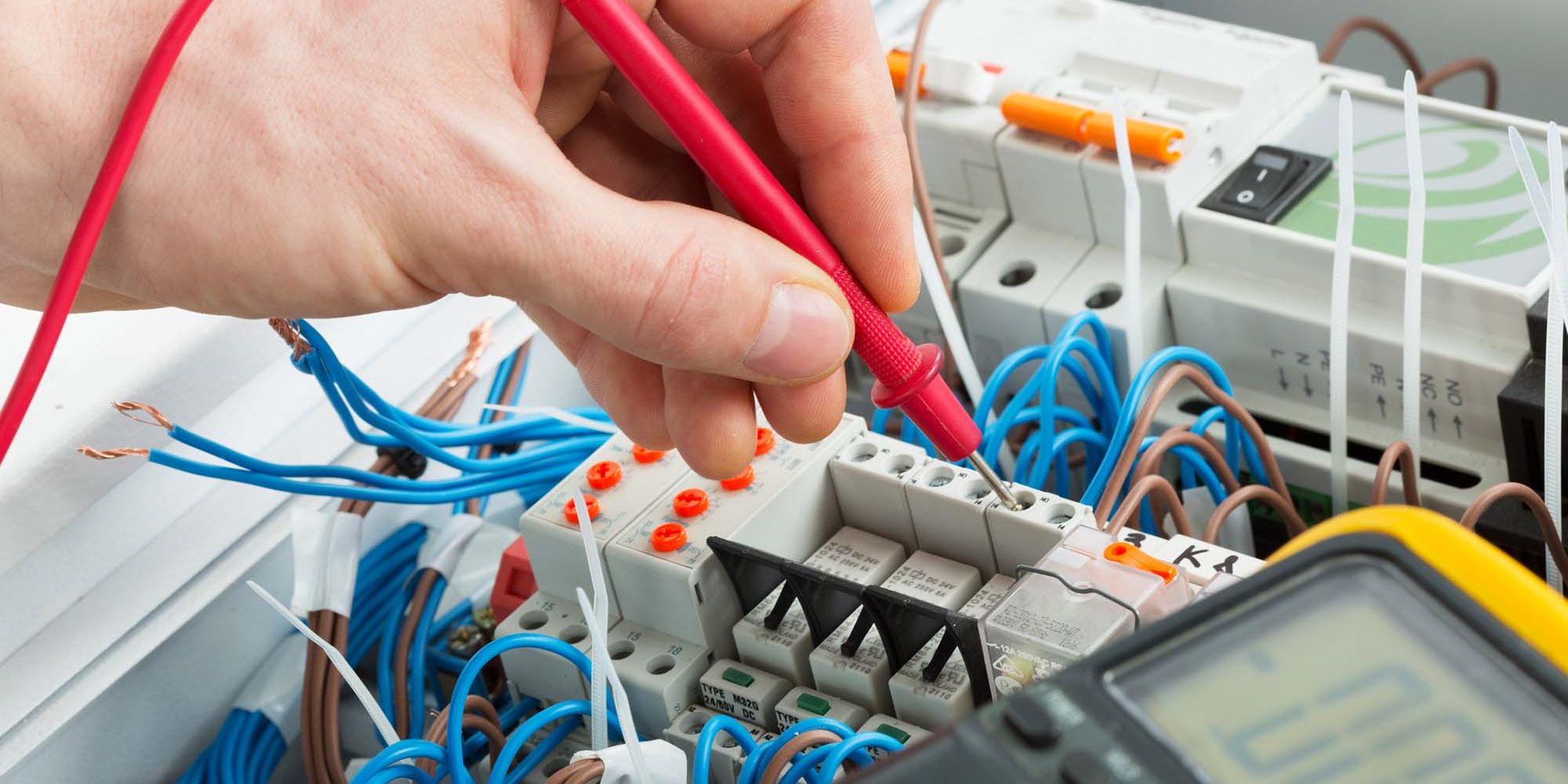 Electrician Installs Socket In New House